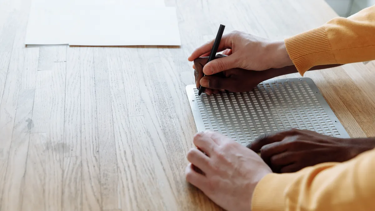 Accessible content writing tools: features that help writers with disabilities — A Person Writing on White Paper
