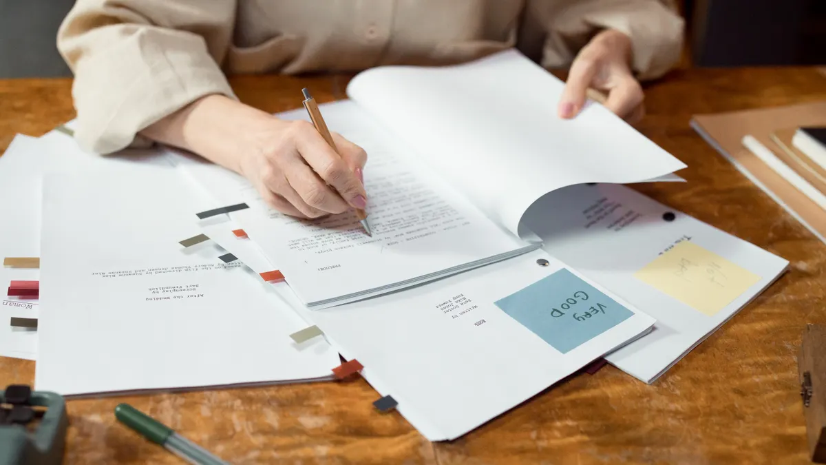 Best editing and proofreading tools for content writers: catch grammar, clarity, and tone Best editing and proofreading tools for content writers: catch grammar, clarity, and tone — Person Writing on White Pape