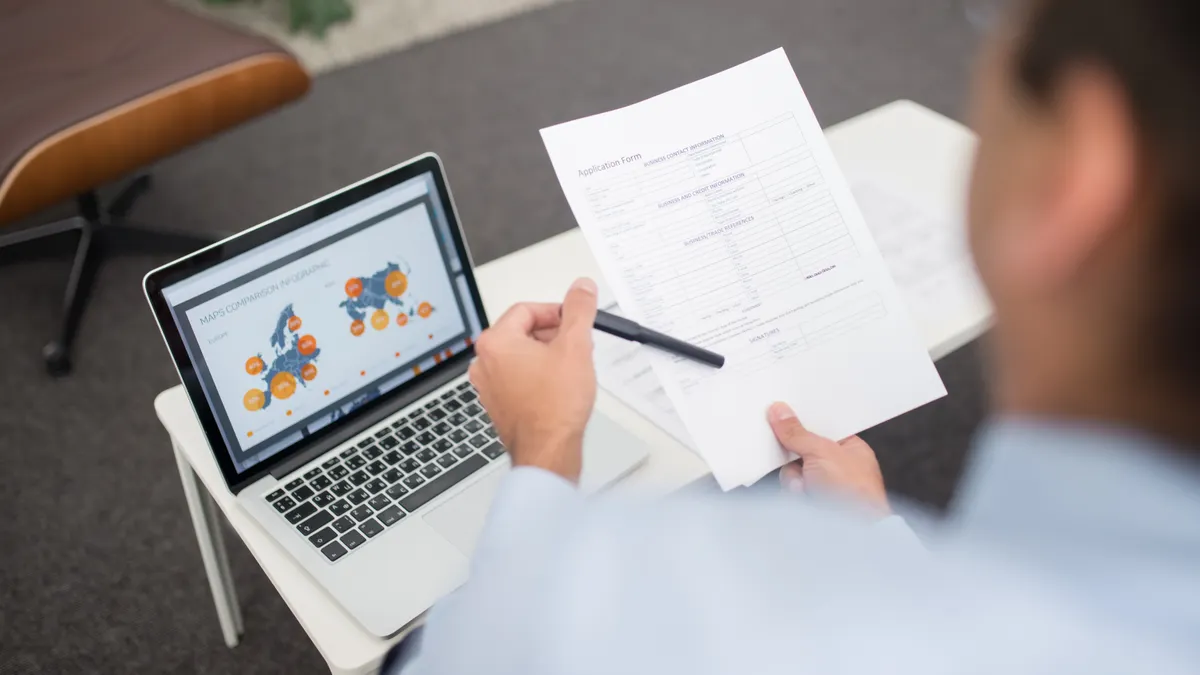 Tools for long-form content: software for reports, ebooks, and pillar pages Tools for long-form content: software for reports, ebooks, and pillar pages — A Man Holding an Application Form